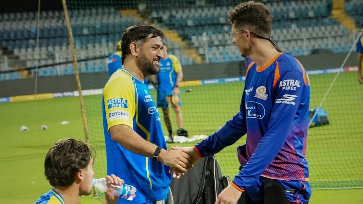MS Dhoni with Mitchell Santner